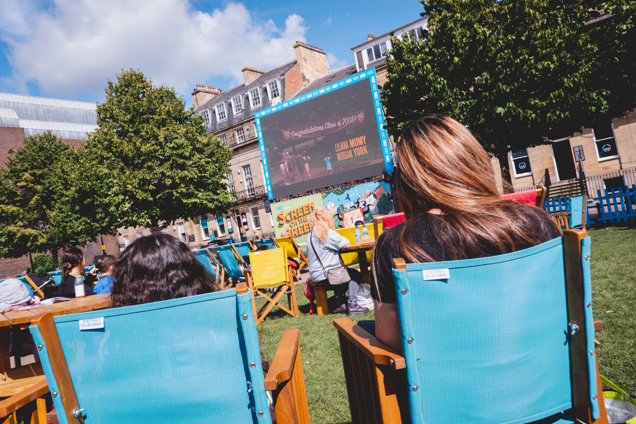 Two people watching a film at Screen on the Green